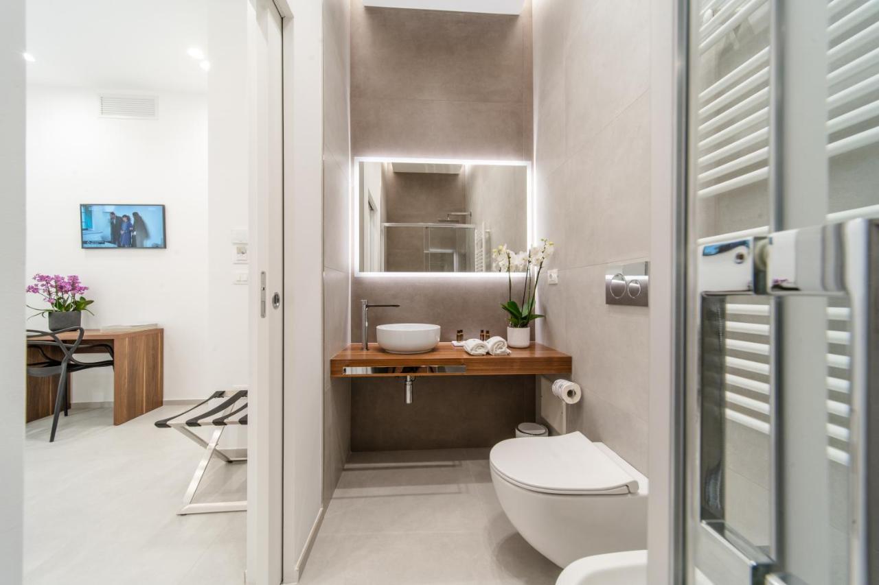 Daline Holiday Rooms อักกวาริกา เดล กาโป ภายนอก รูปภาพ